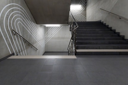 Staircase in a modern building with artistic design.