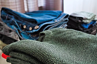 Clothes are neatly stacked.