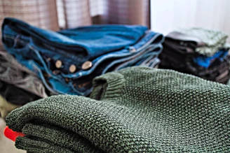 Clothes are neatly stacked.