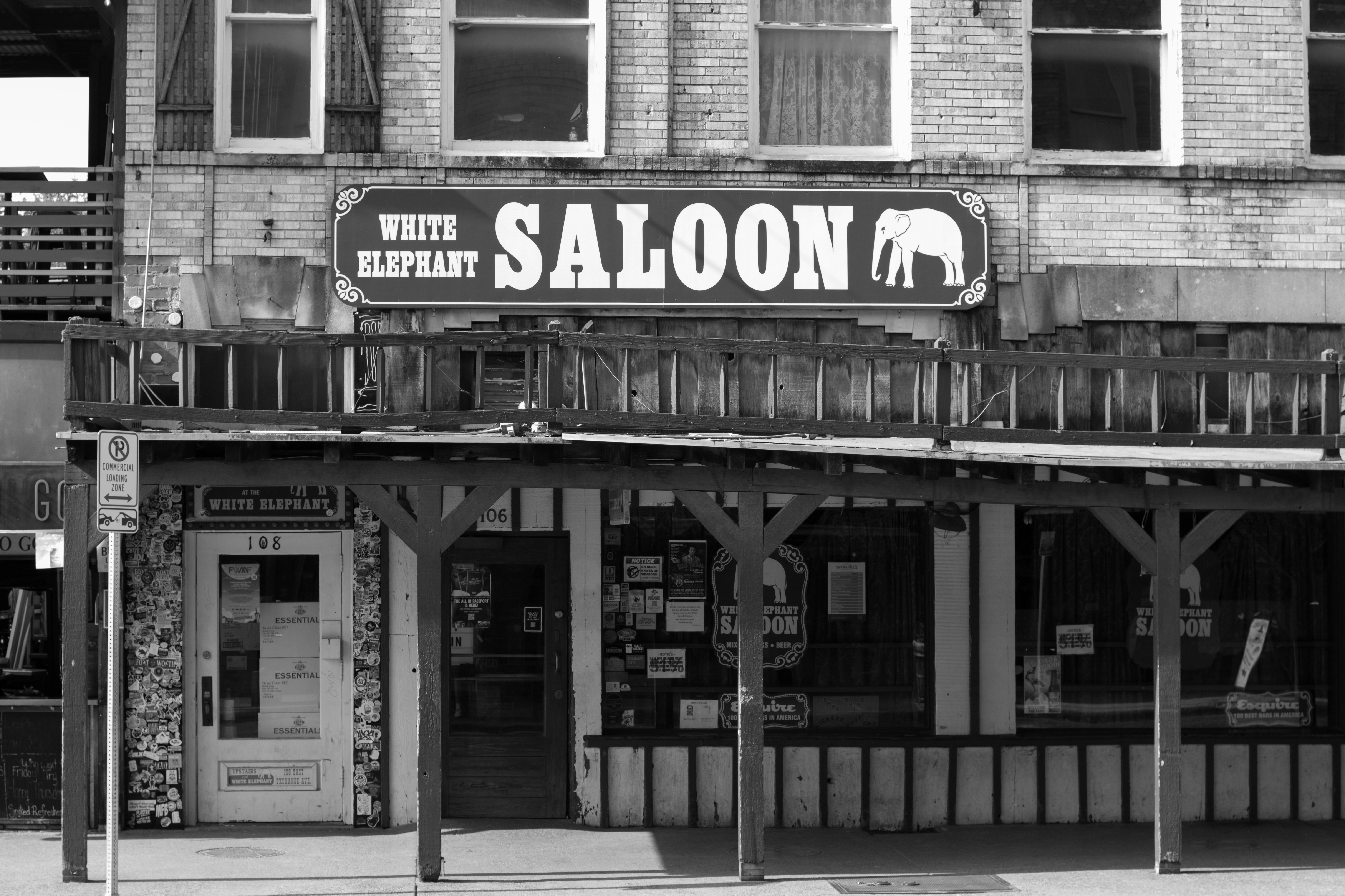 The white elephant saloon is seen in black and white.