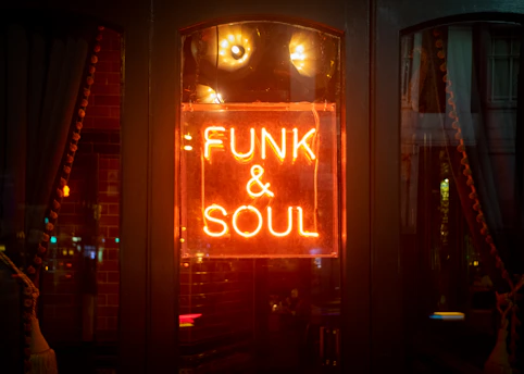 Neon sign announces "funk & soul".