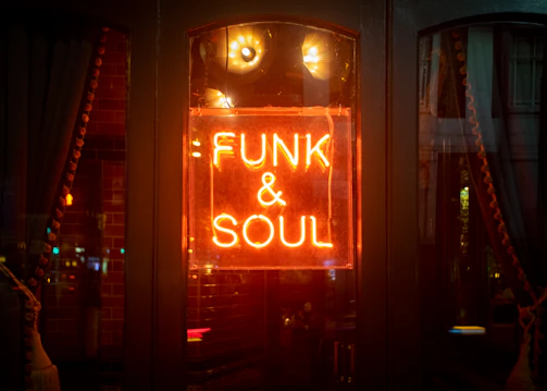 Neon sign announces "funk & soul".
