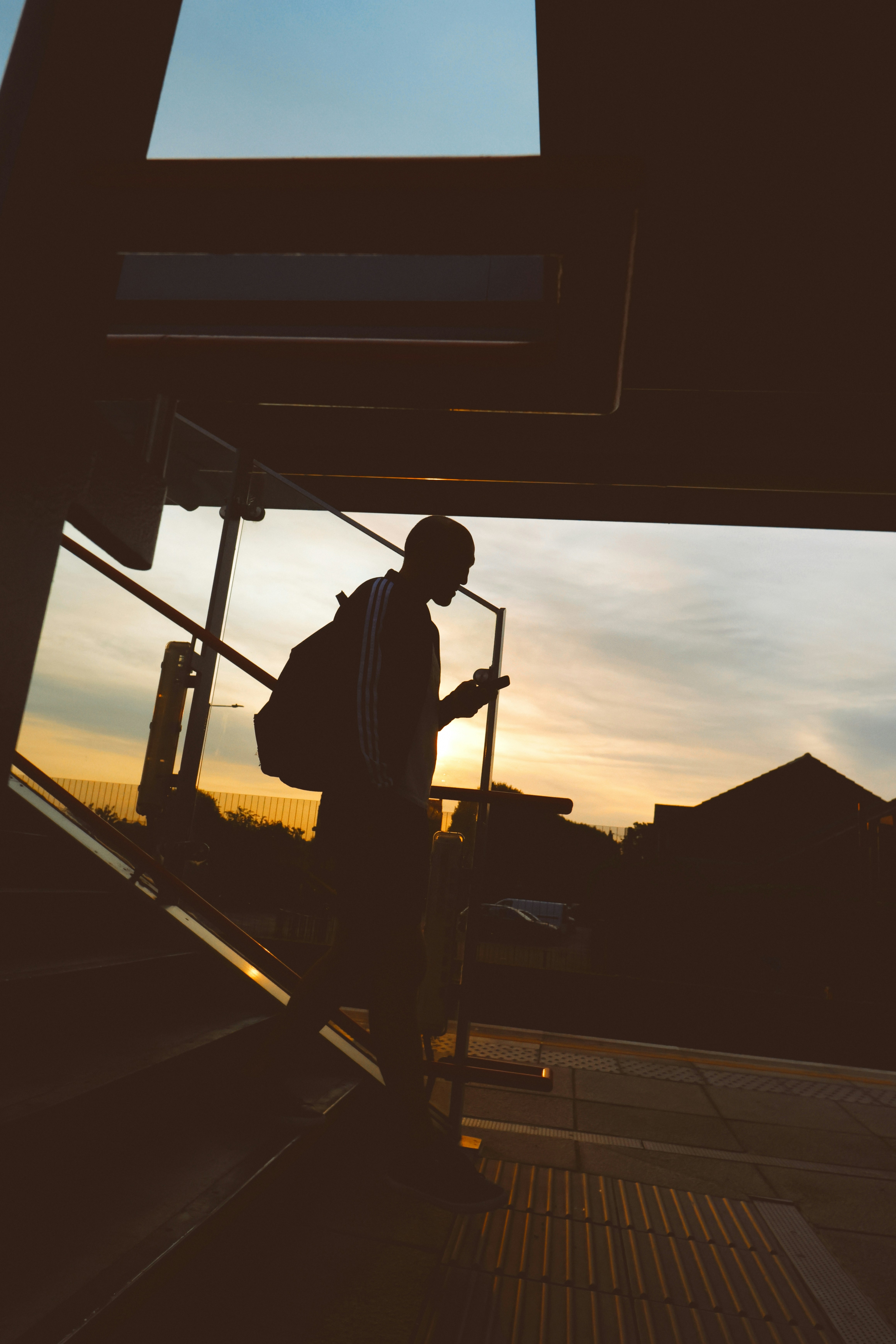 A silhouette of a person at dusk.
