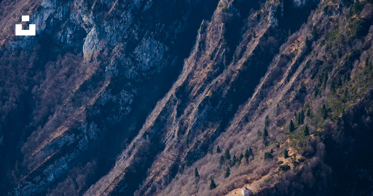 Mountain slope with rugged textures and vegetation. photo – Free Italy ...