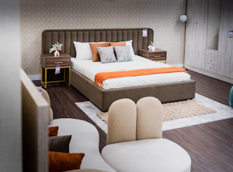A well-styled bedroom displaying furniture and decorations