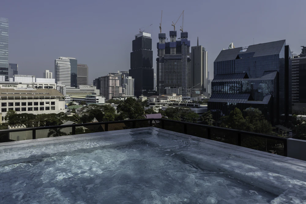 Rooftop pool overlooking the city skyline