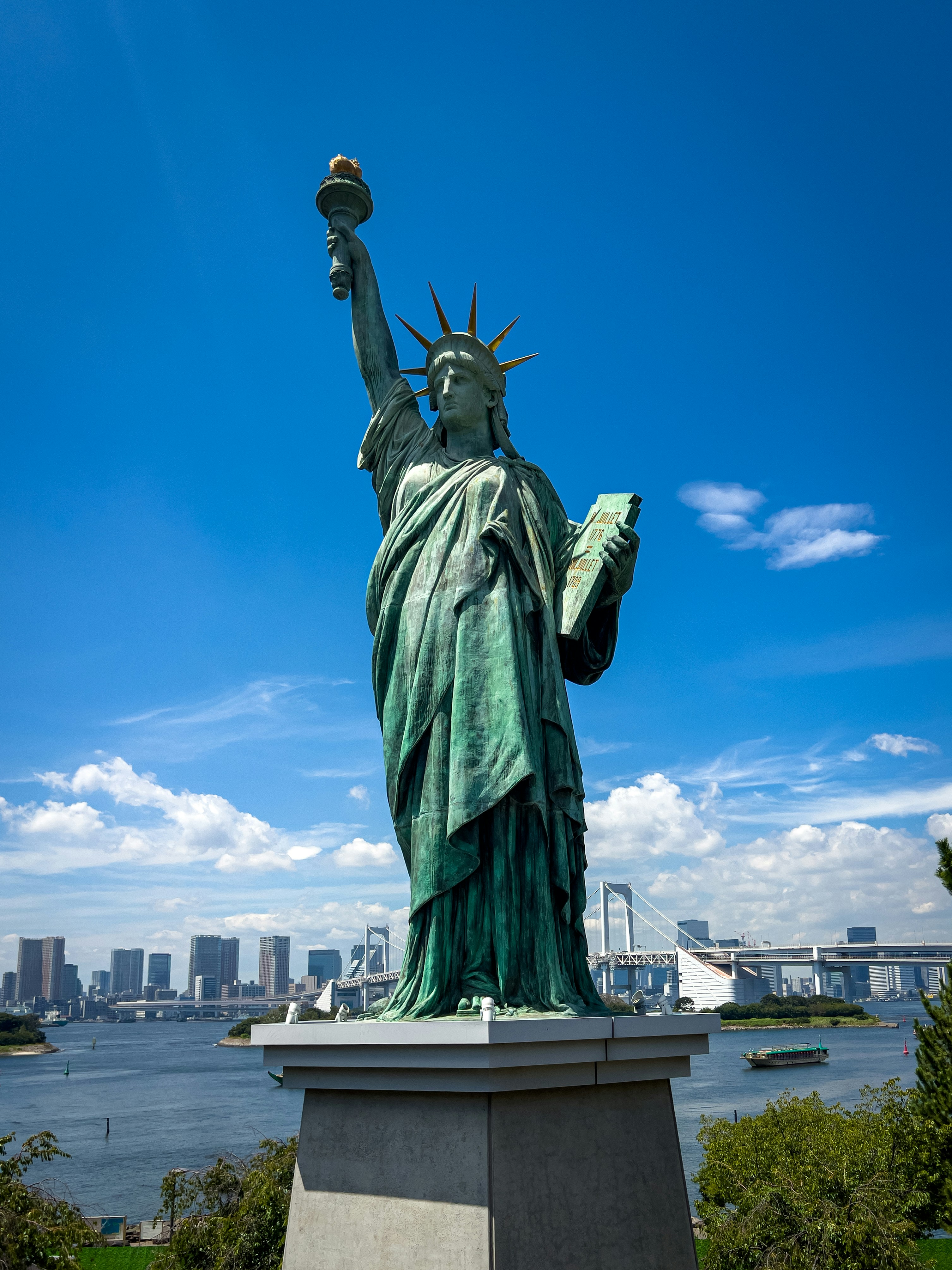 The statue of liberty stands tall in tokyo.