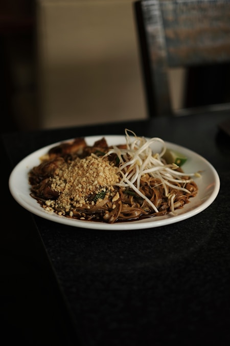 Pad Thai noodles with peanuts and bean sprouts in a bowl