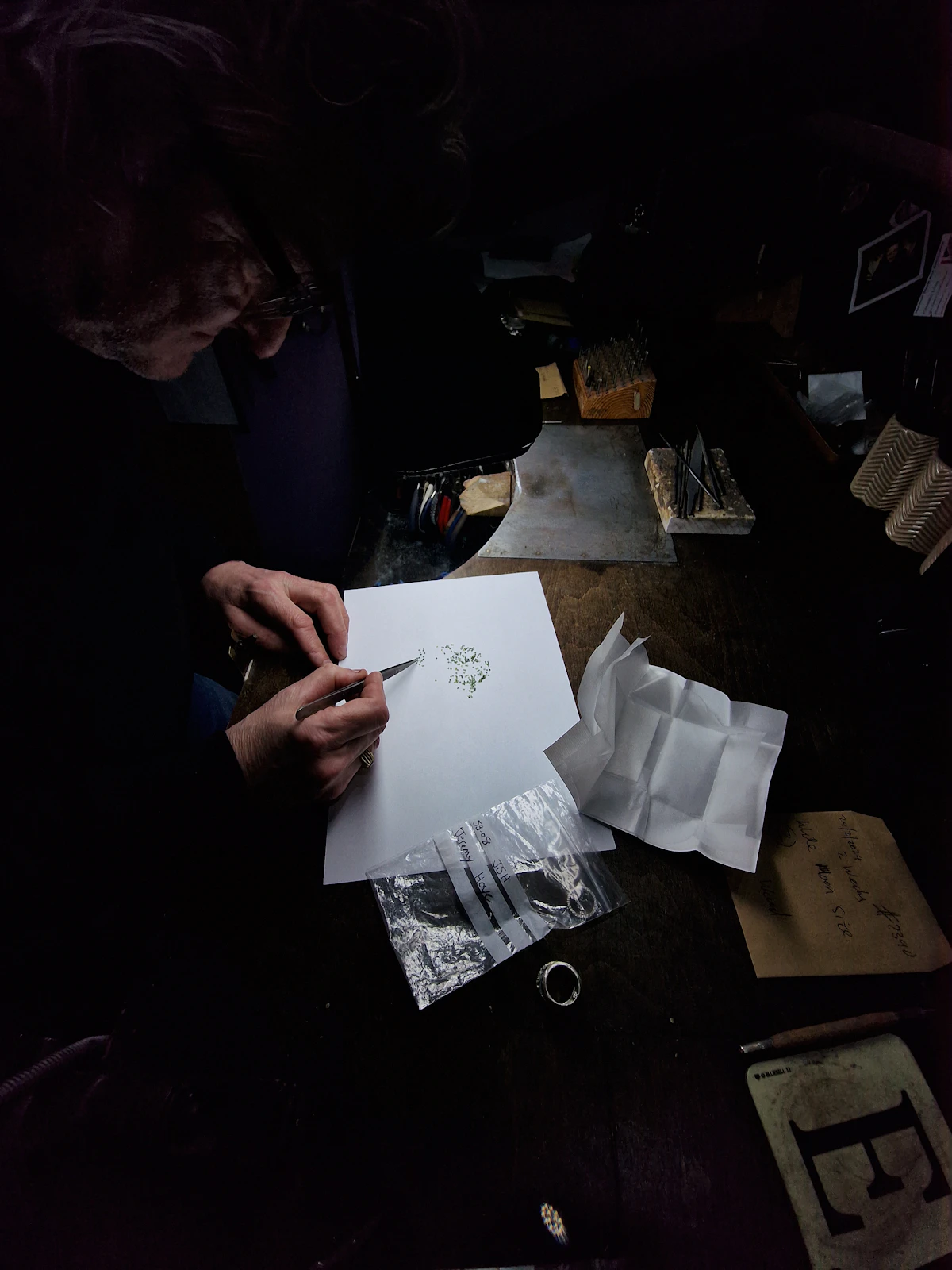 Designer sketching a custom jewelry piece