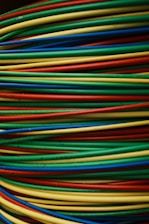 Colorful wires are stacked together in a bundle.