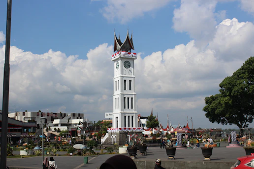 The great jam gadang clock tower stands tall.