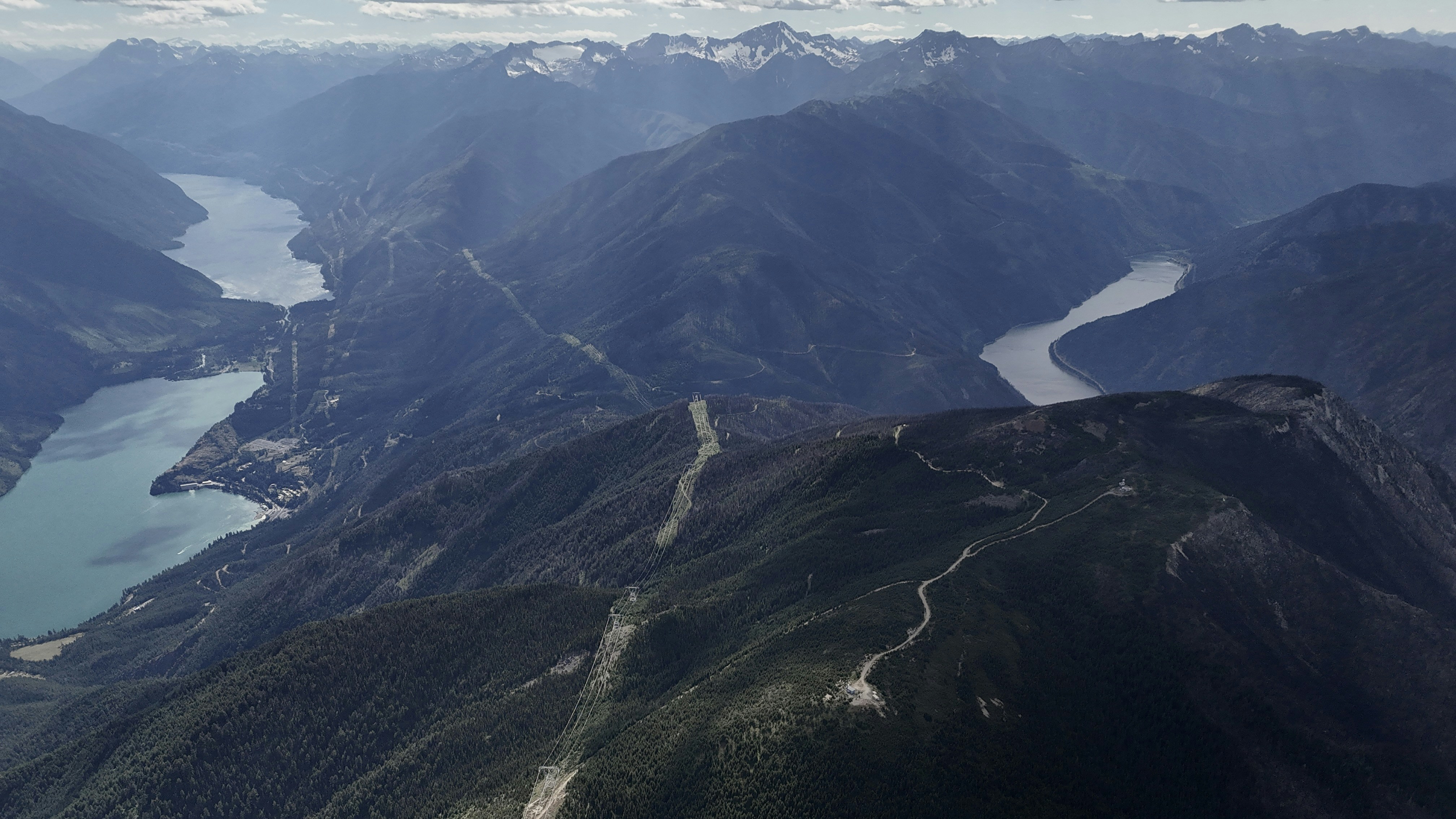 Mountains and rivers create a scenic view.