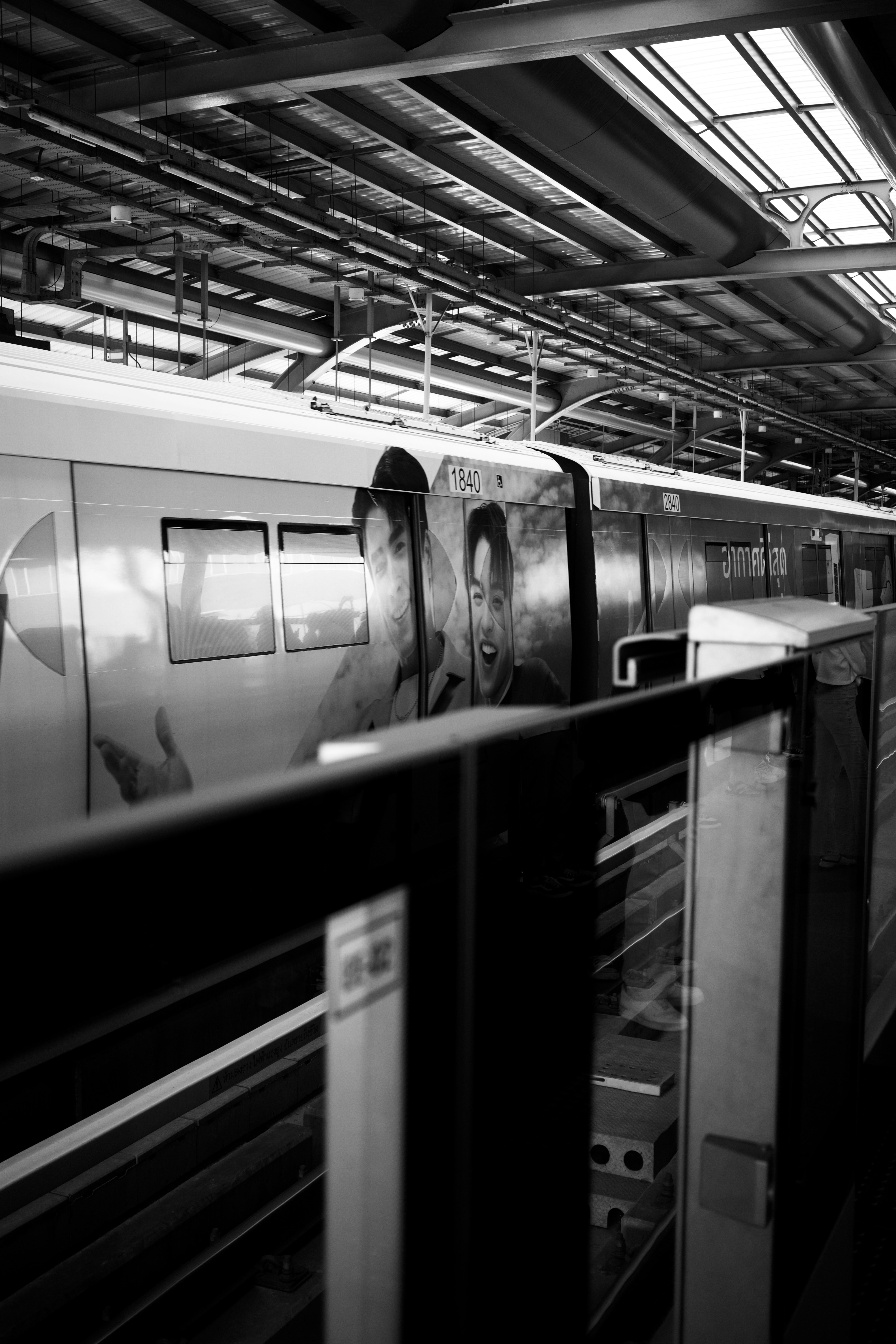 Train at station with advertising on side