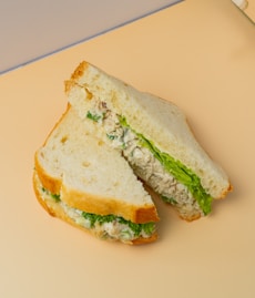 Chicken salad sandwich with lettuce on white bread