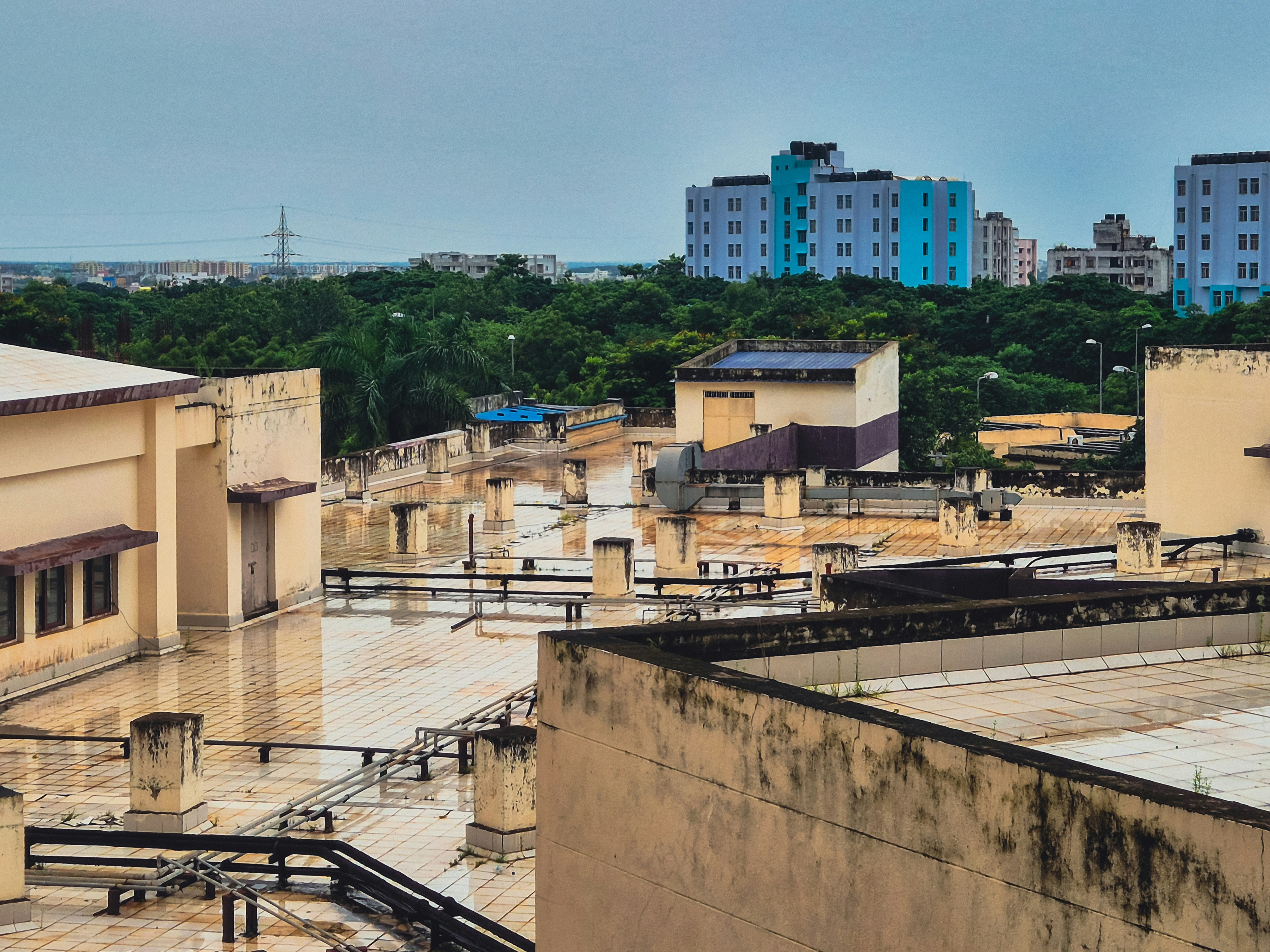 Rooftops and buildings under a cloudy sky
