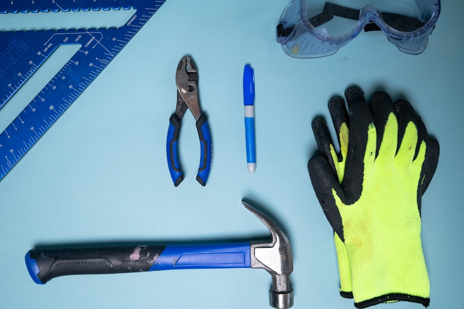 Tools including hammer, pliers, marker, gloves, and safety glasses.