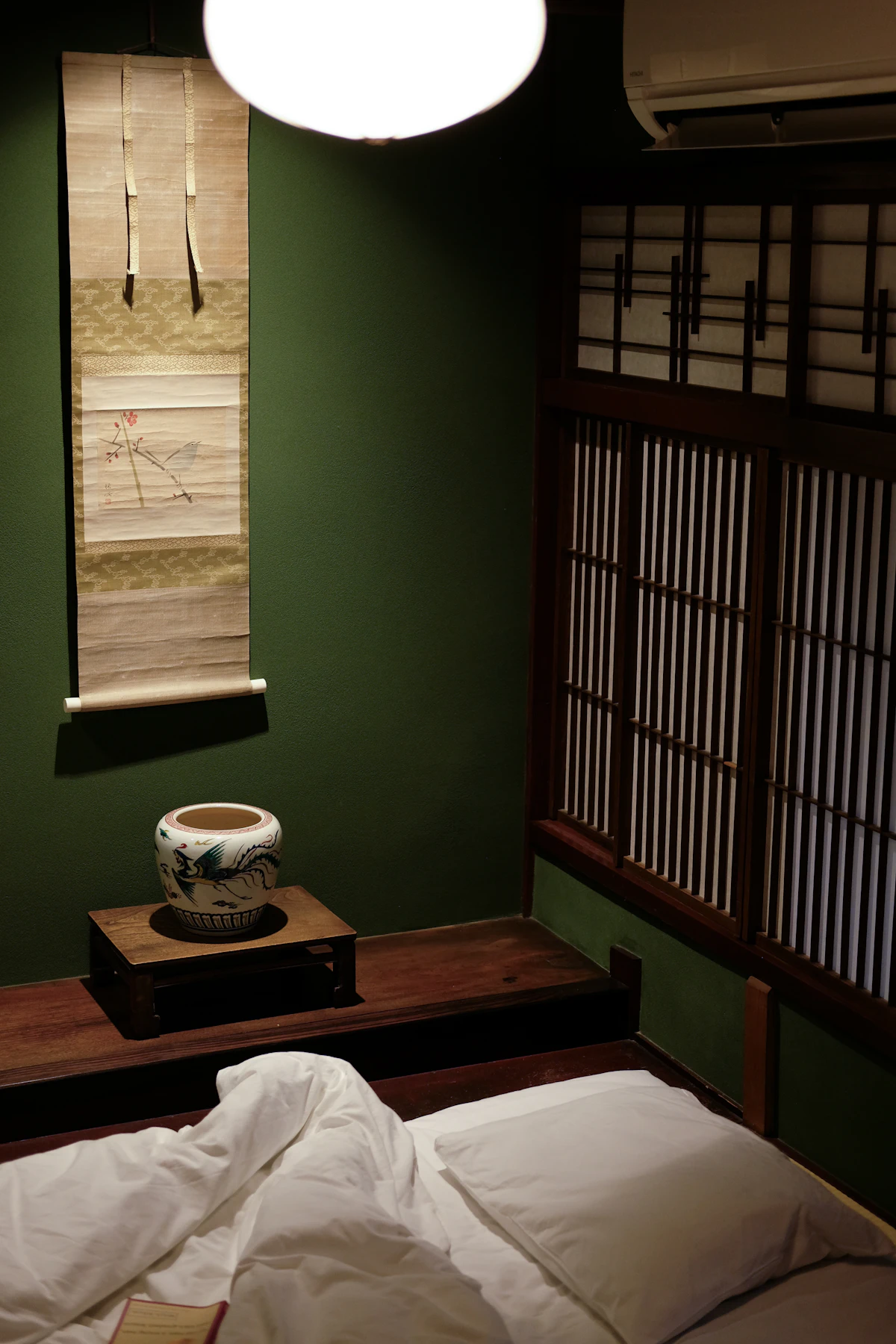 Traditional Japanese tatami room with shoji screens at a ryokan