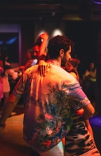 Couple dancing closely in a dimly lit room