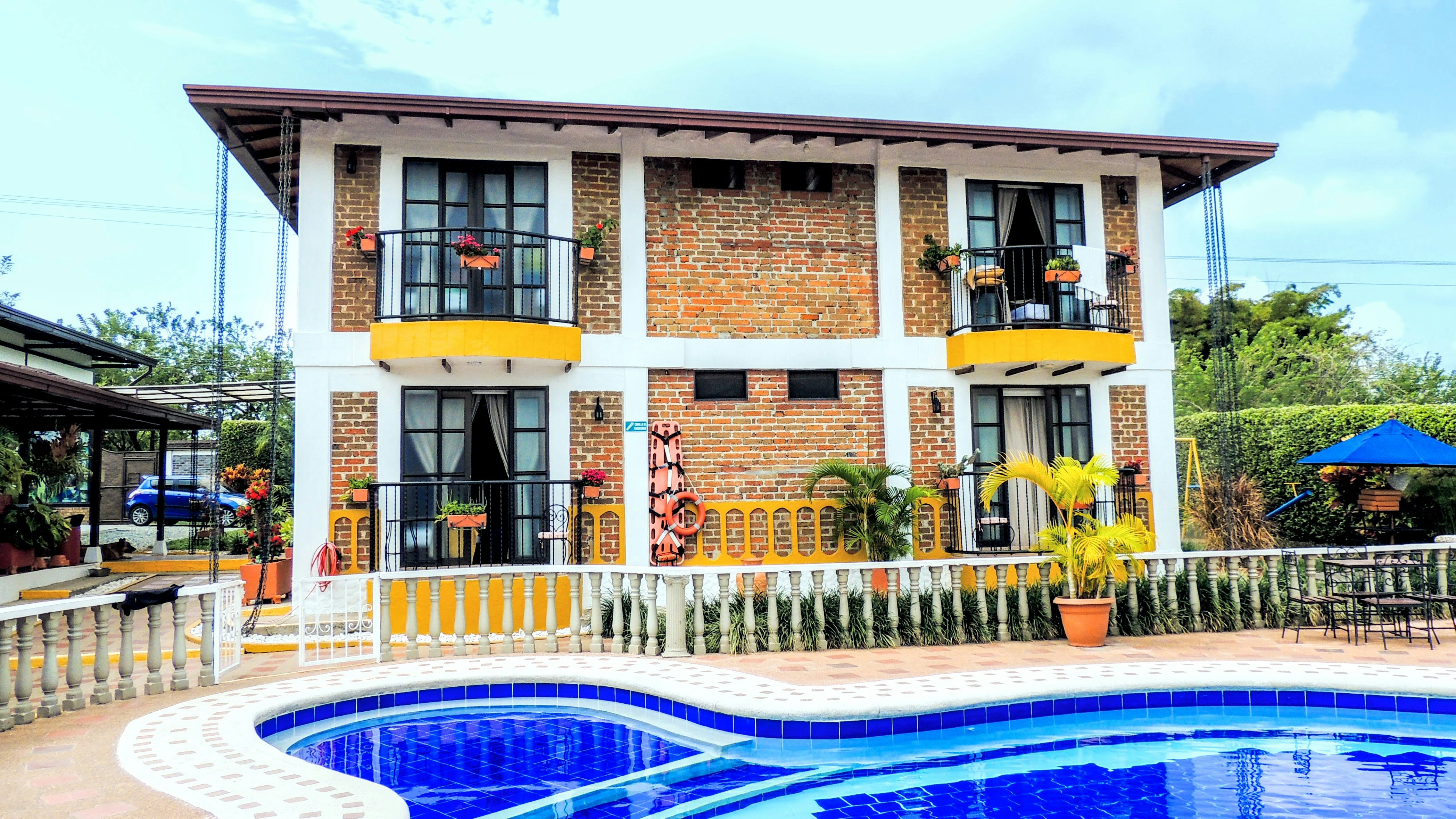 Modern building with a swimming pool in front