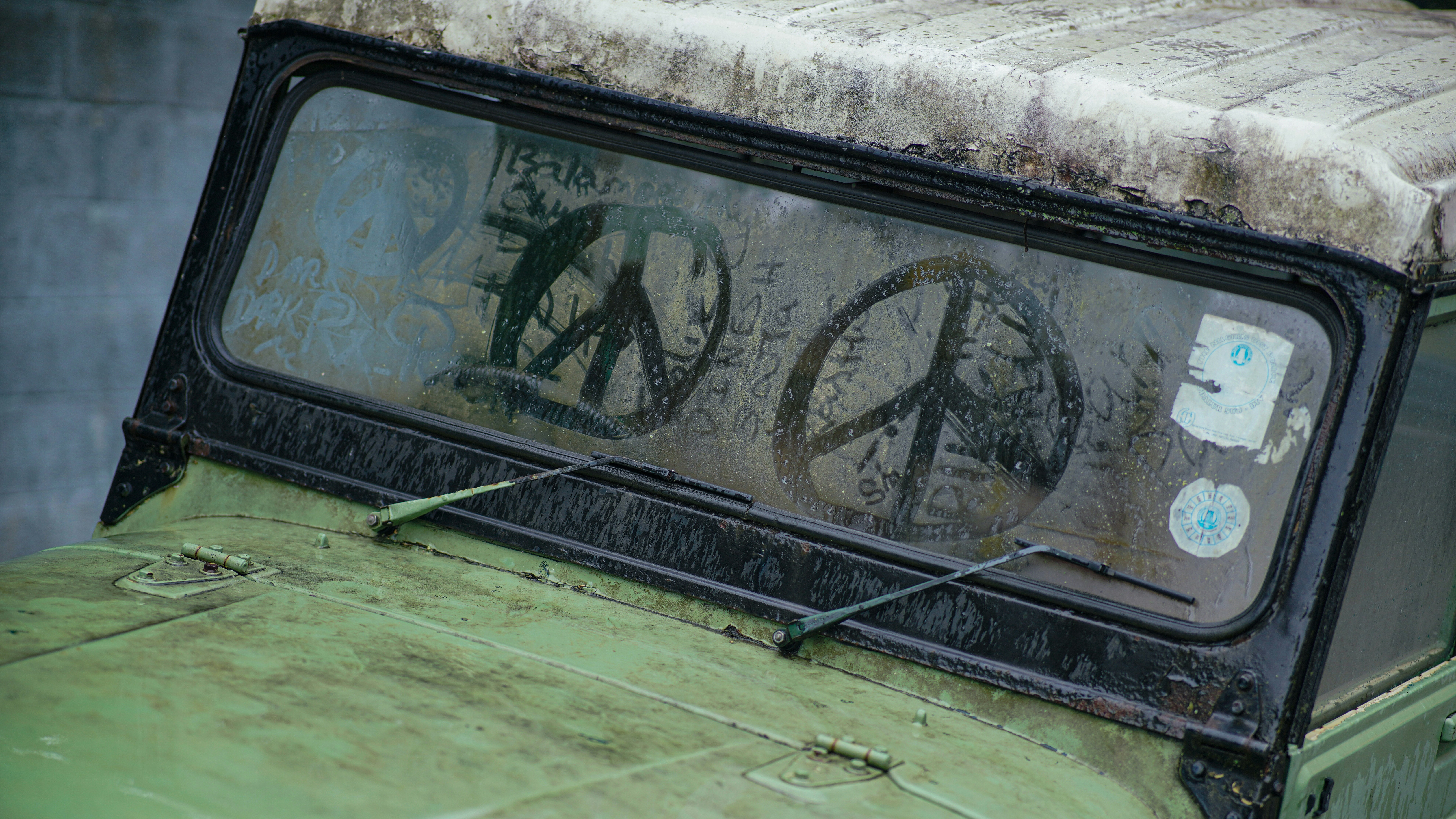 Close-up of a broken control panel with symbols.