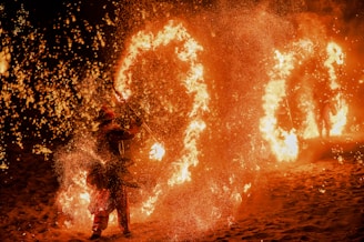 Fire dancer creates a ring of fire