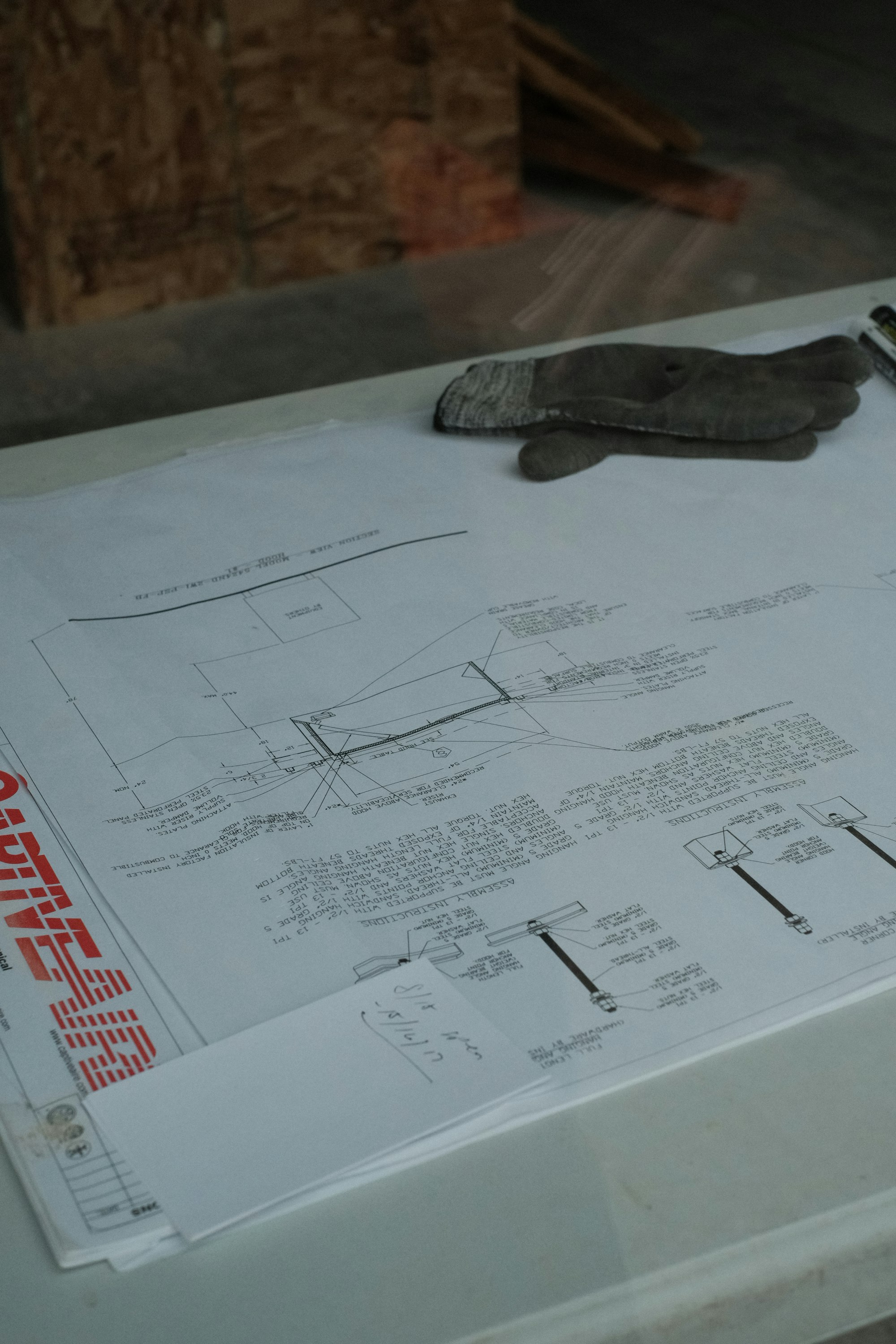 Architect working through renovation plans and blueprints