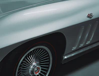 Close-up of a classic silver car fender