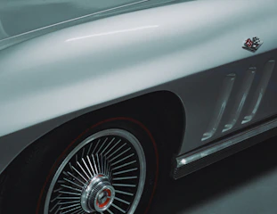 Close-up of a classic silver car fender