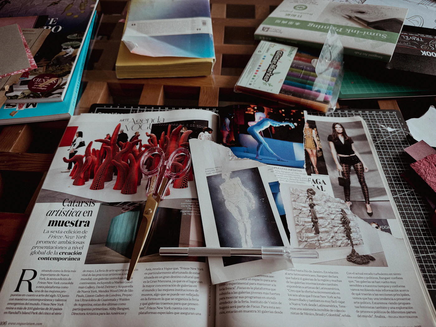 Open magazines with various articles and pictures