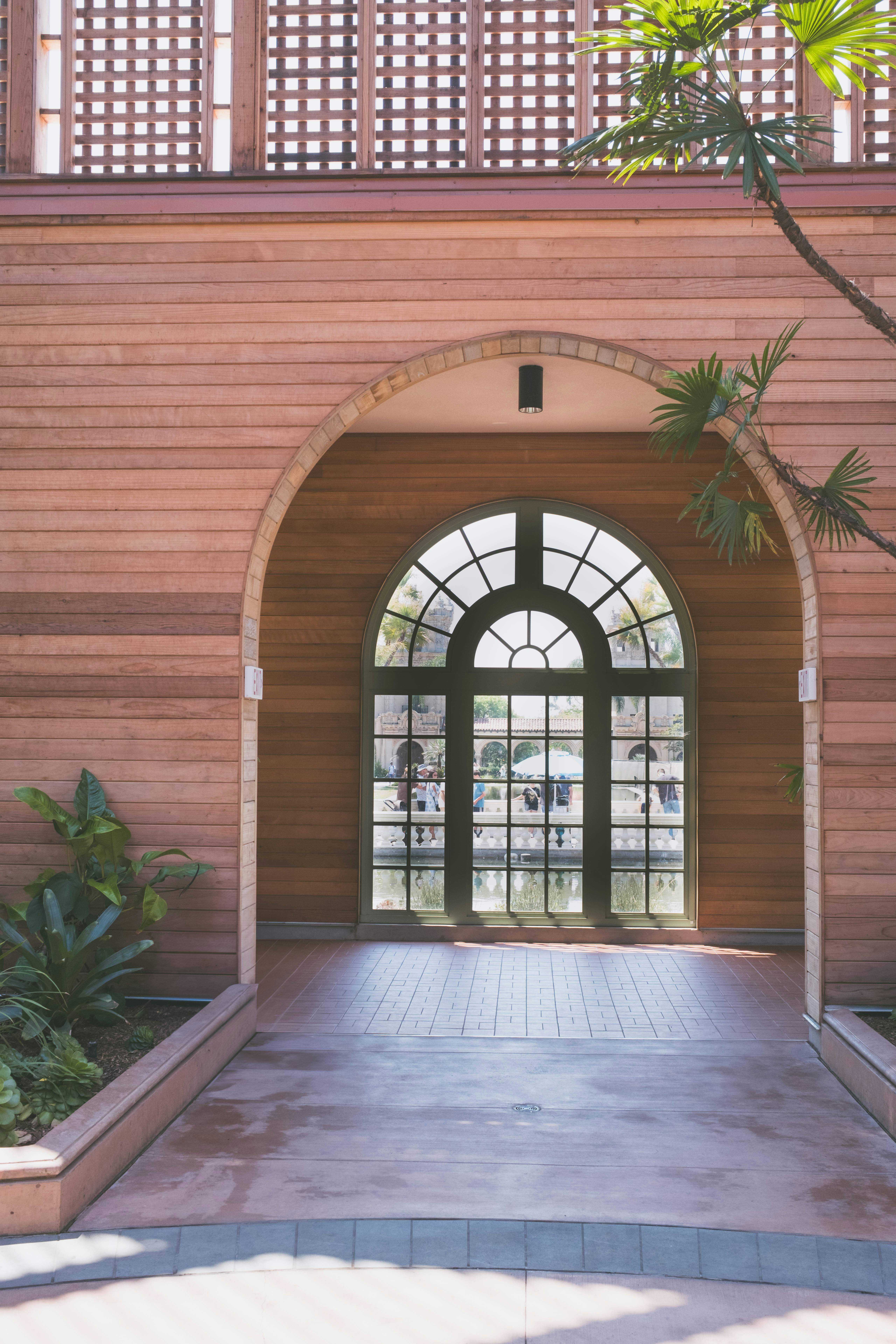 Arched doorway with large window overlooking water
