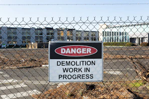 Danger sign for demolition work in progress.