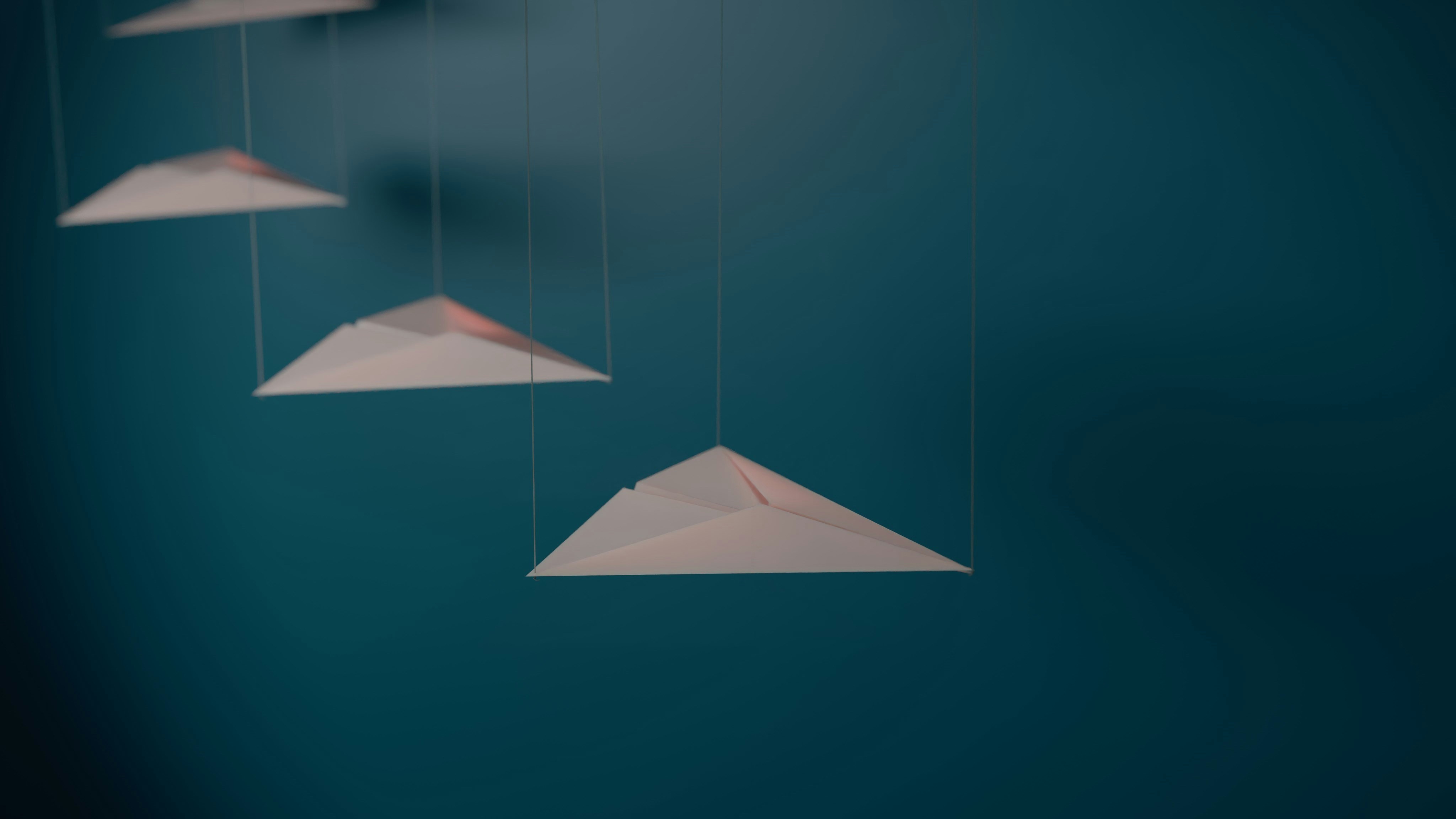 Triangle shapes on a teal background