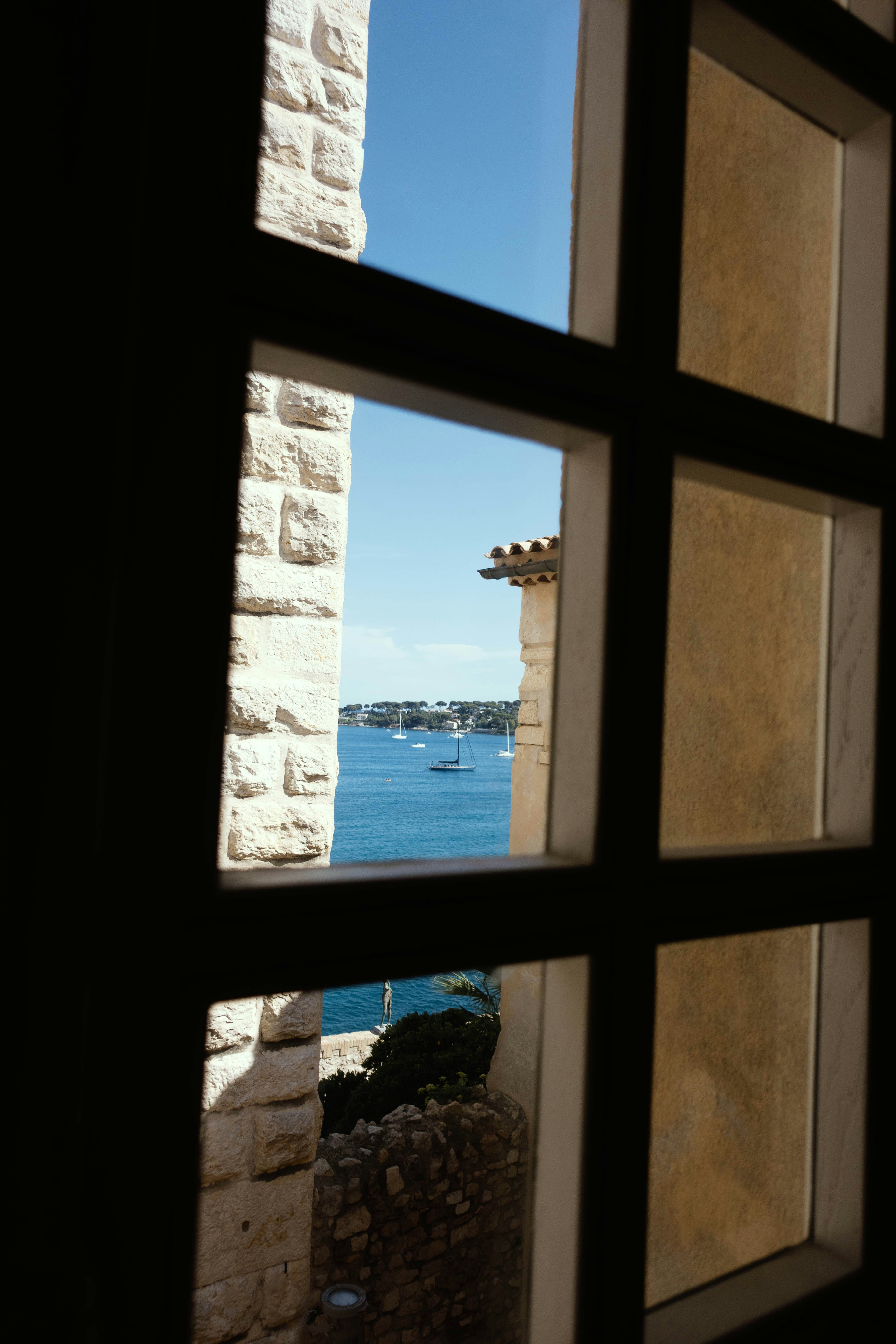 View of the ocean through a window