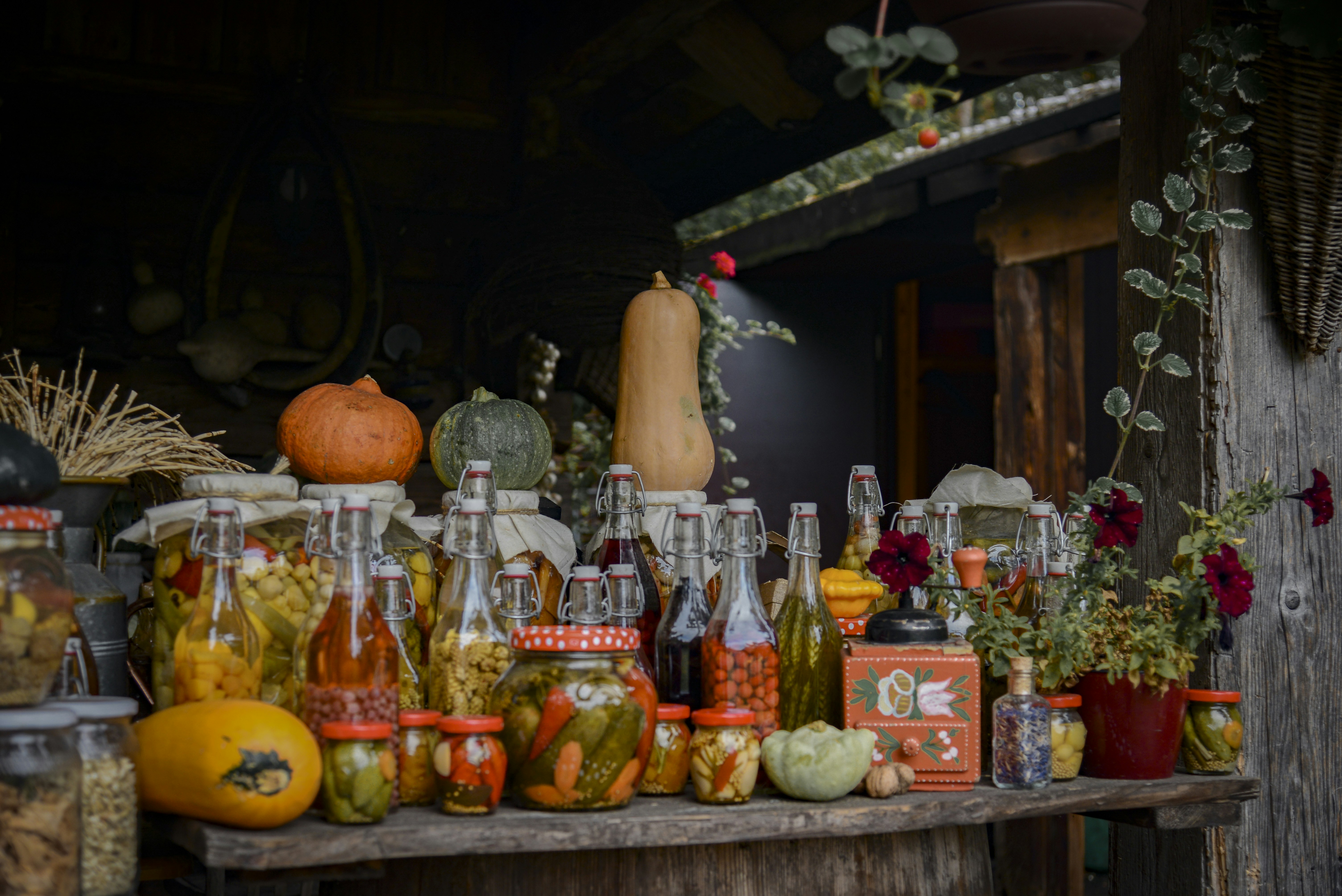 Autumn harvest display with pumpkins and jars