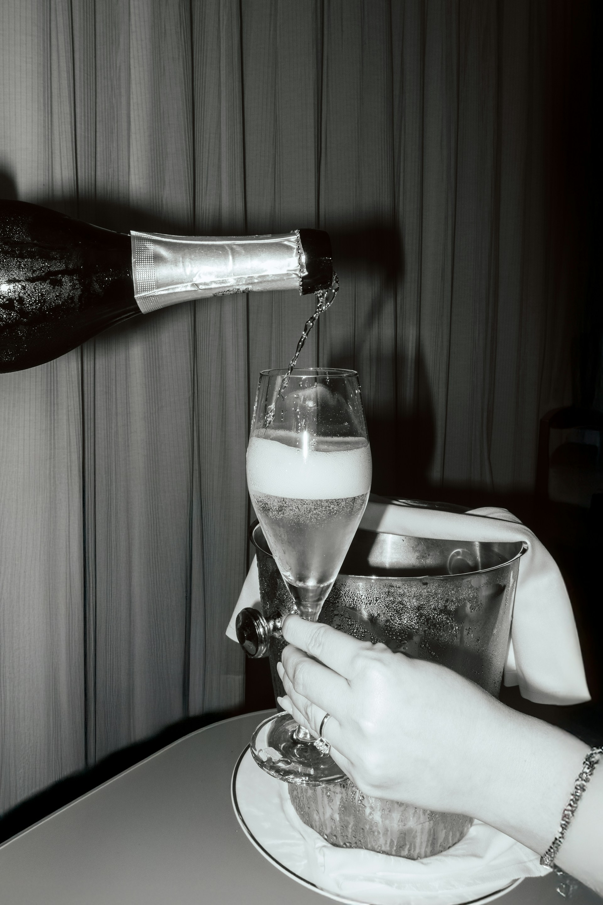 Champagne being poured into a glass