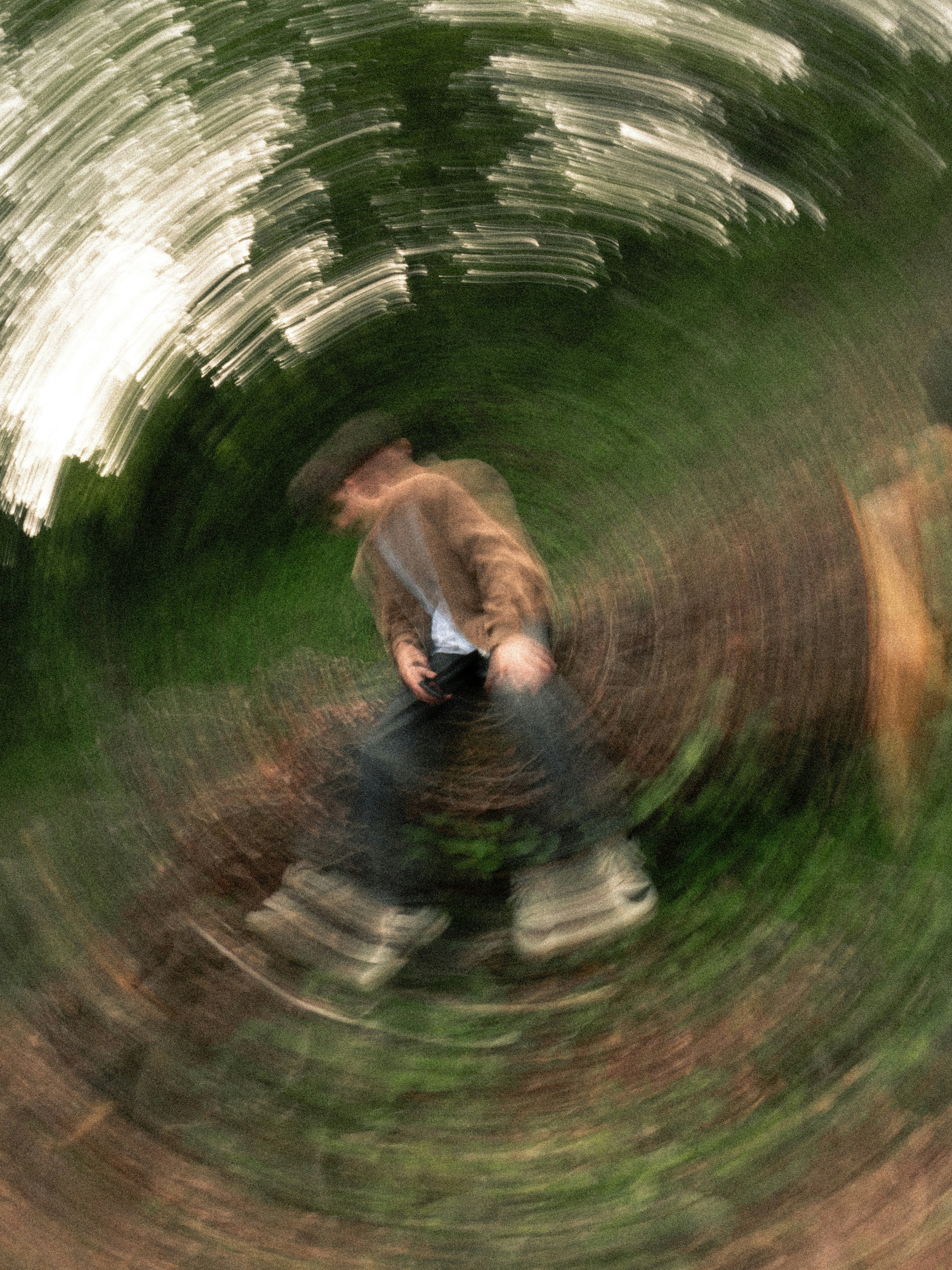 Person spinning in a circular motion blur
