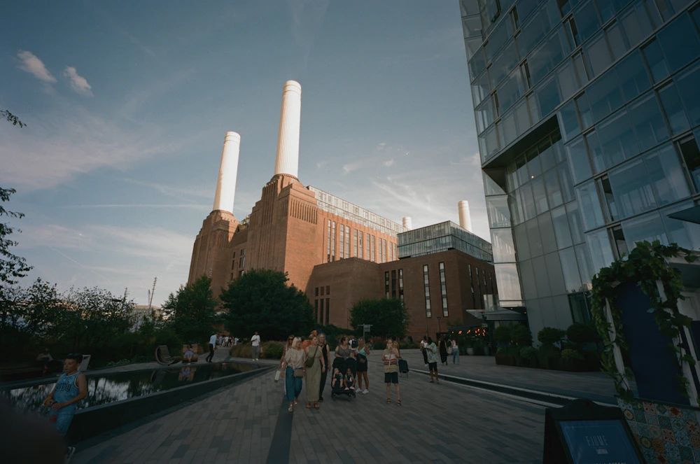 Battersea Power Station beside modern riverside public space