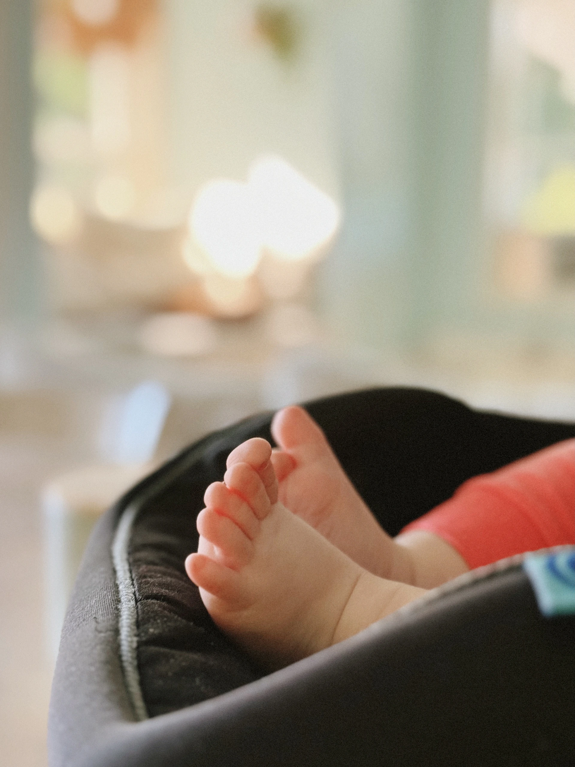 Close up of a baby's tiny feet resting