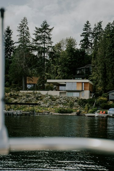 Inside a Cantilevered Lake House That Floats Above the Shoreline