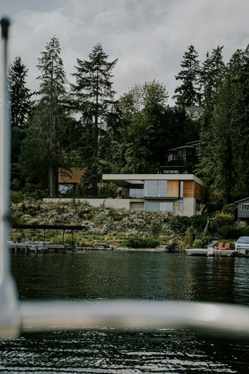 Inside a Cantilevered Lake House That Floats Above the Shoreline