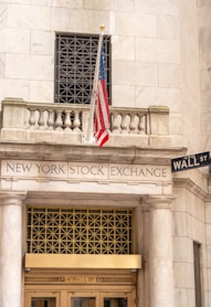 New york stock exchange building with american flag