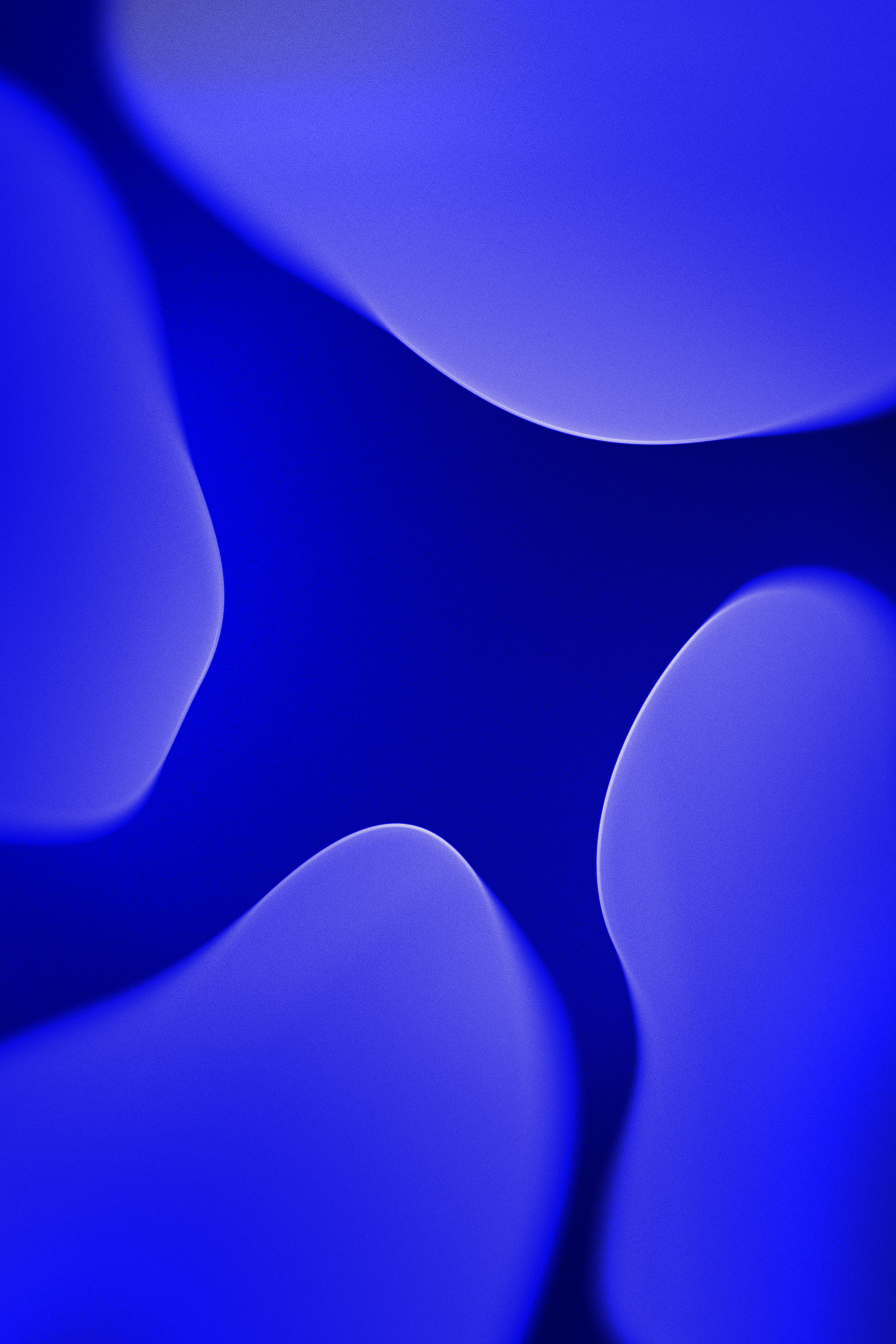 Abstract blue shapes on a dark background