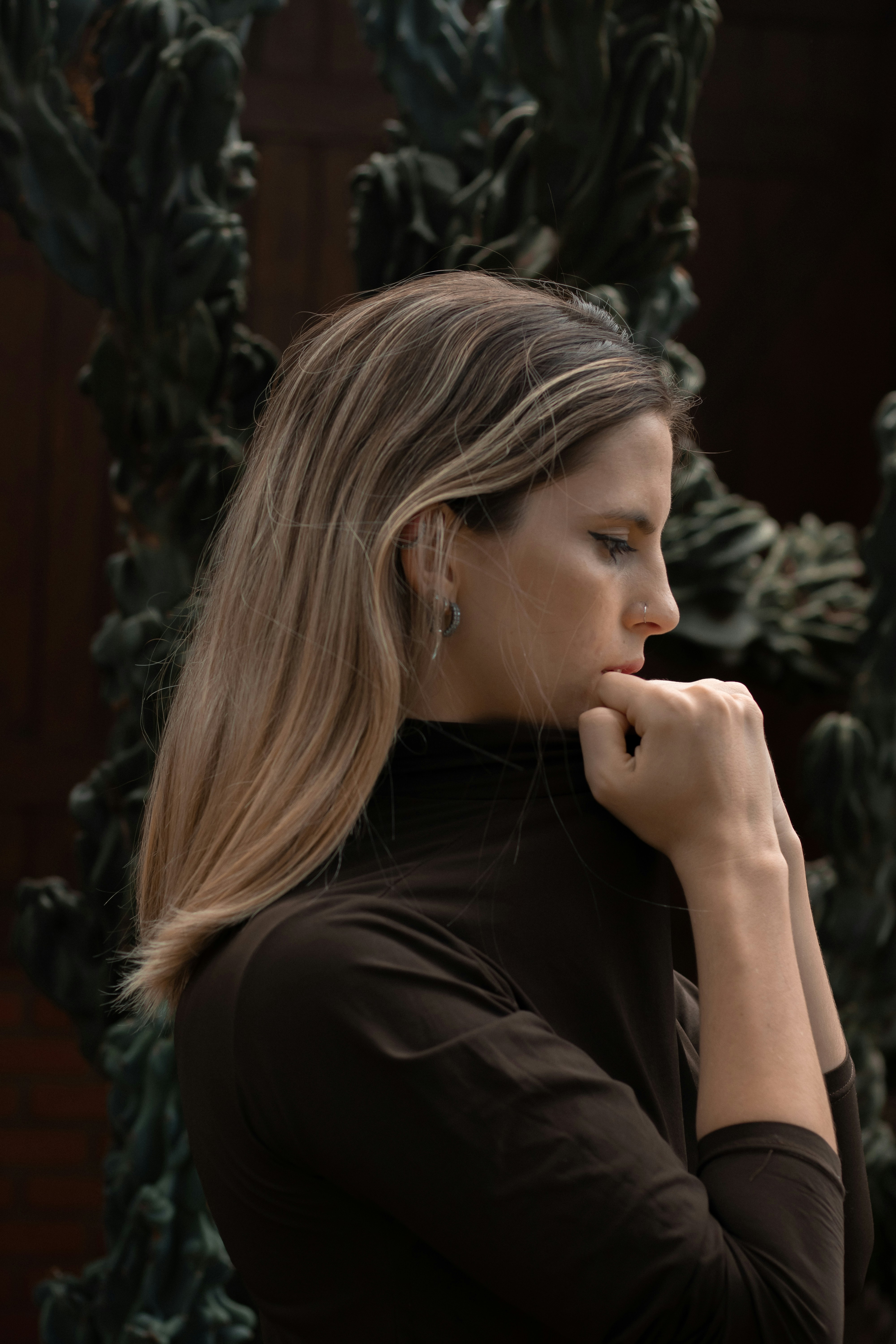 Woman with blonde hair looking down thoughtfully downwards thoughtfully downwards thoughtfully downwards thoughtfully downwards thoughtfully downwards