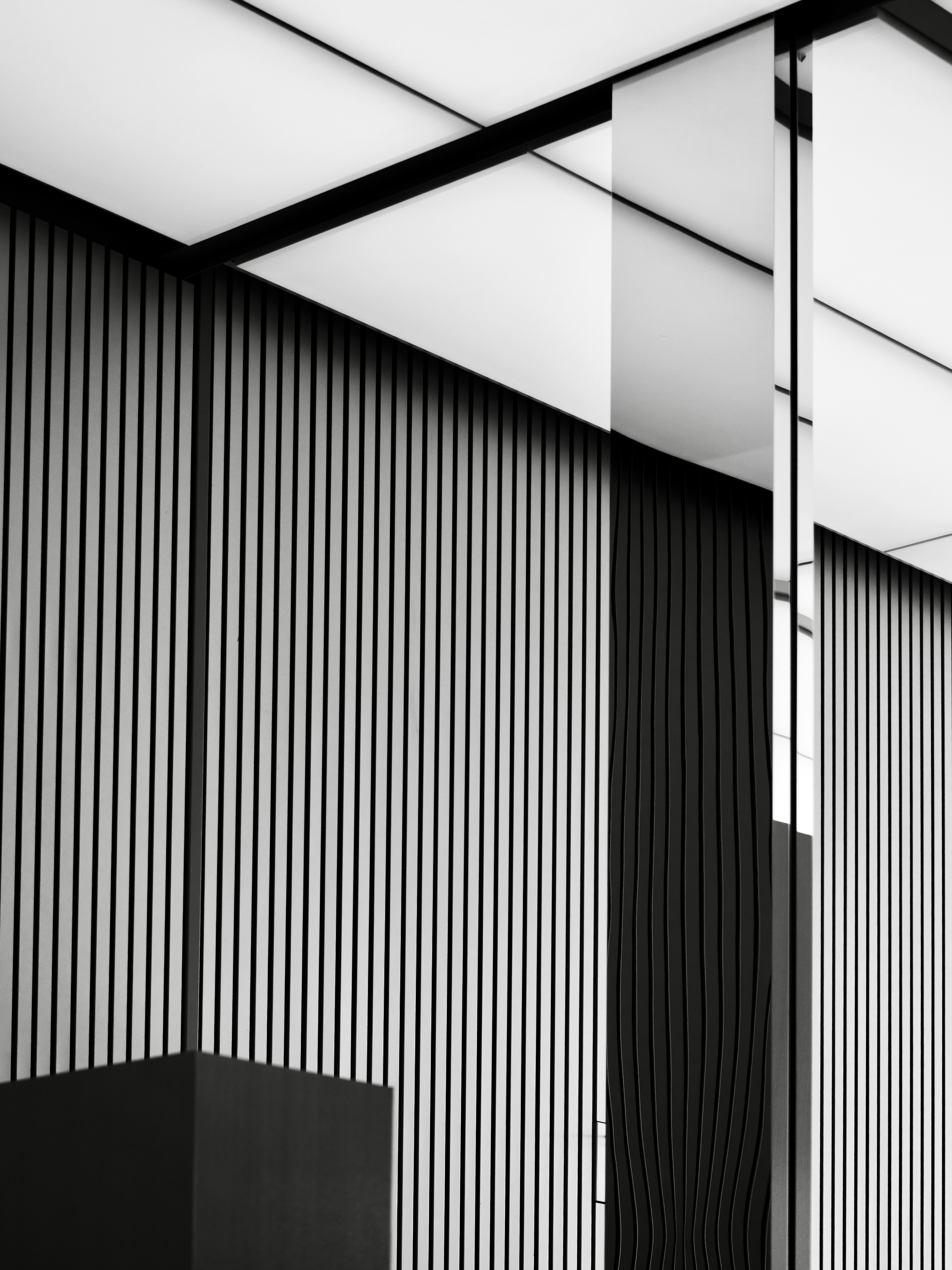 Modern interior with textured walls and lighting