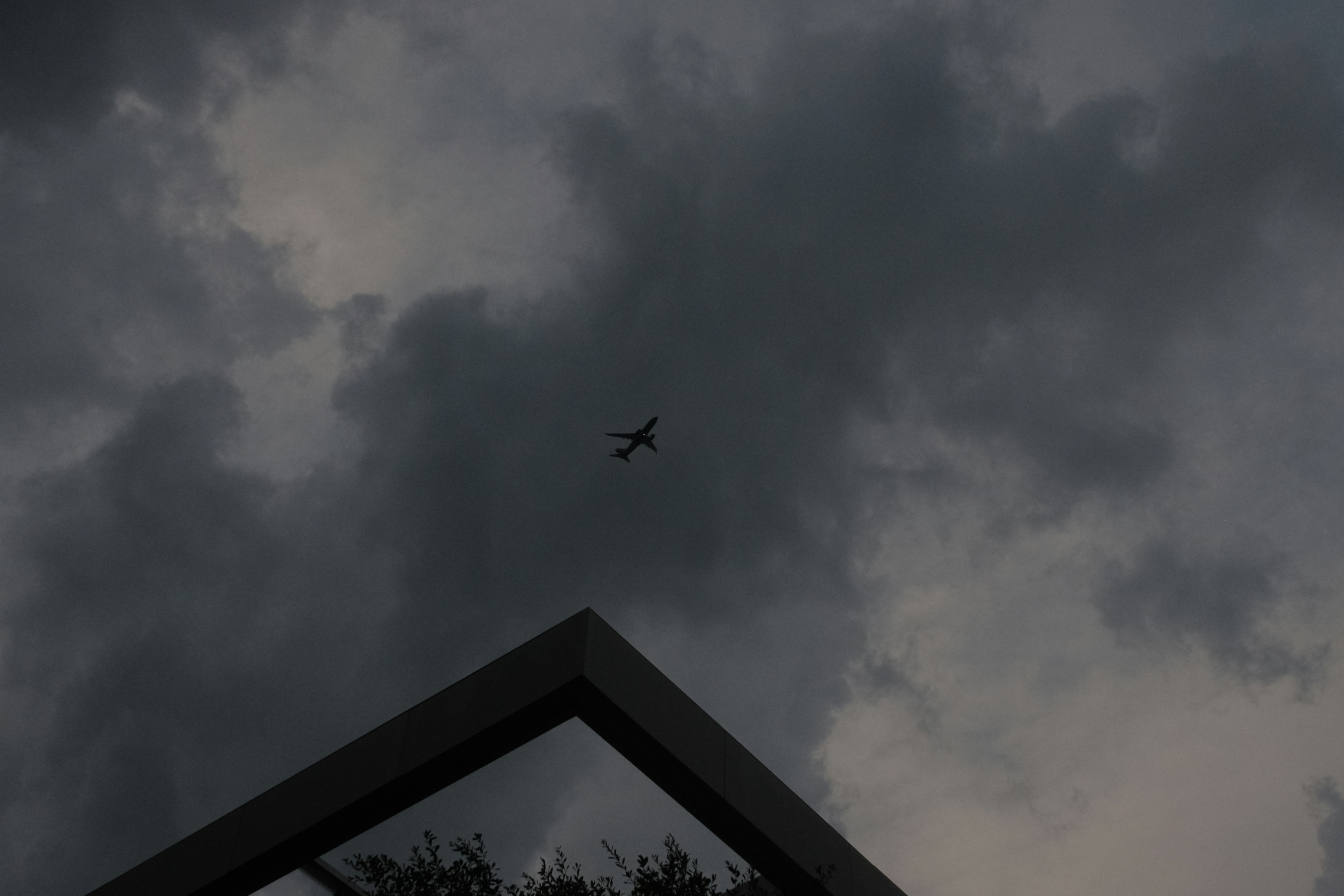 A drone flying in a cloudy sky
