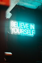 Neon sign says "believe in yourself"
