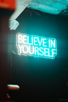Neon sign says "believe in yourself"