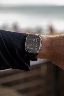 Person wearing a smartwatch showing activity data