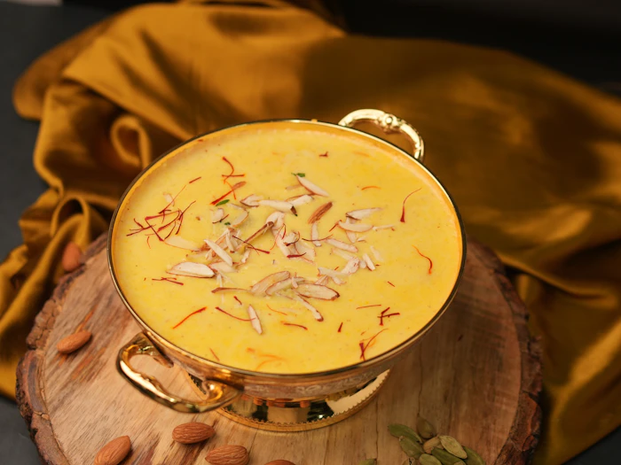 Saffron shrikhand in a small bowl
