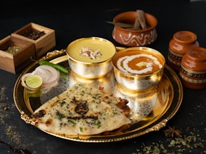 Indian food served on a traditional platter